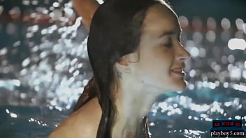 Tiny Russian teen babe Vi Shy swims naked in a pool